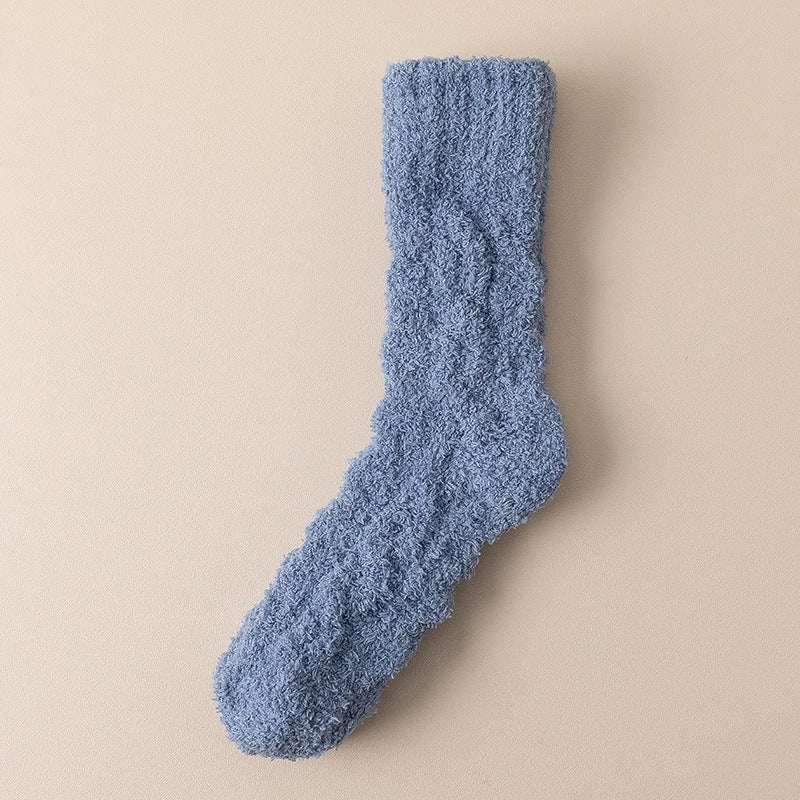 Plush coral fleece socks in various colors, designed for cozy and comfortable home wear