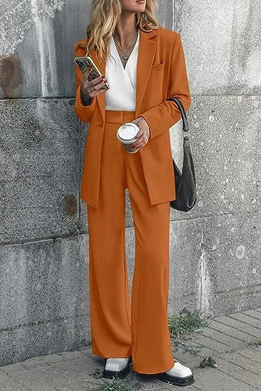 Tailored ladies' suit in various colours, featuring a jacket and trousers made of premium polyester fabric.