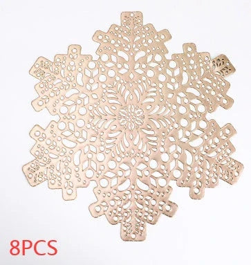 Snowflake-patterned heat-resistant placemats in gold and silver colors, ideal for holiday table settings and decor
