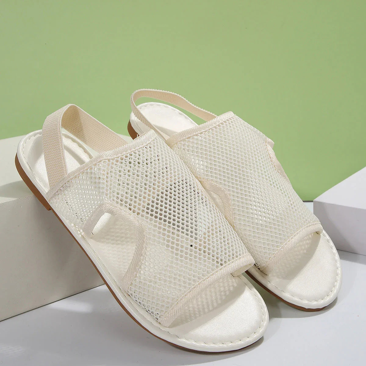 Breathable mesh sandals in various colors and styles for comfortable summer wear