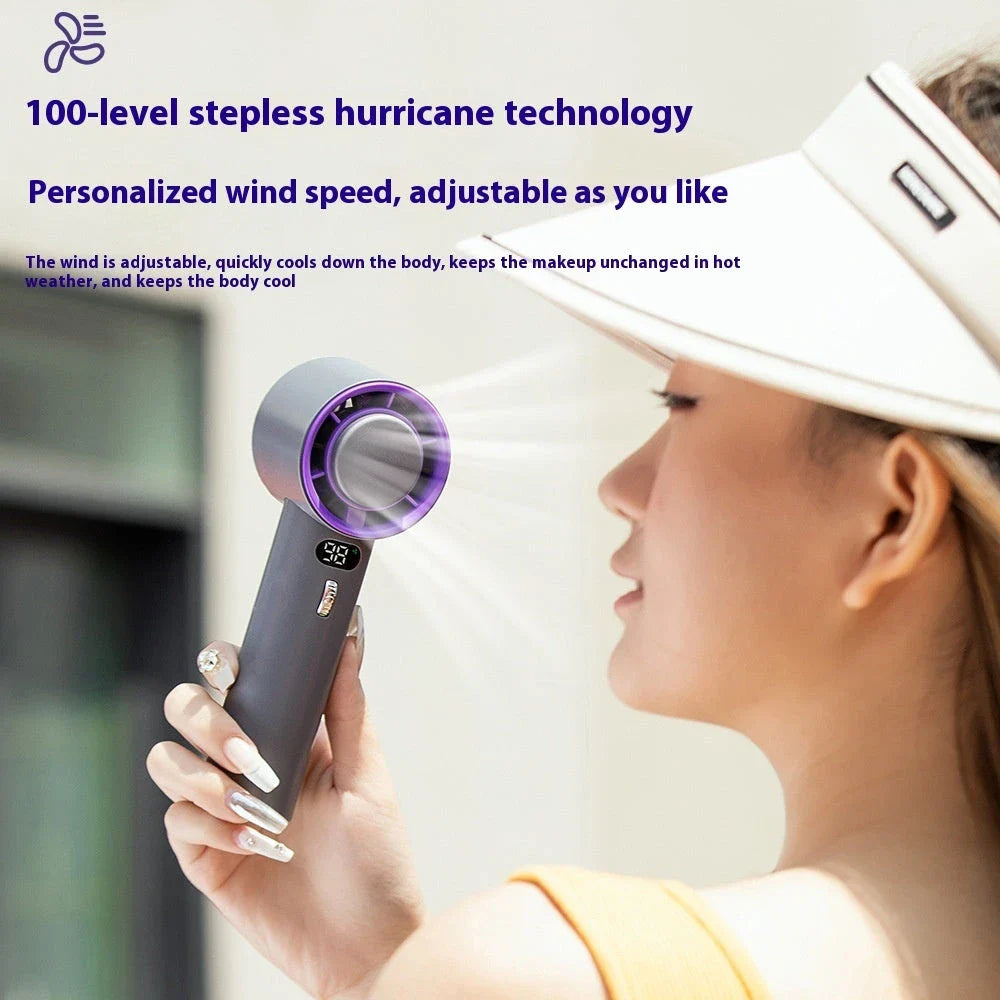 Powerful portable handheld turbine fan with cooling system, adjustable airflow, long-lasting battery, and compact design for on-the-go refreshment.