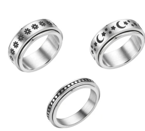 Titanium steel ring with intricate star and moon designs, available in various sizes and colors