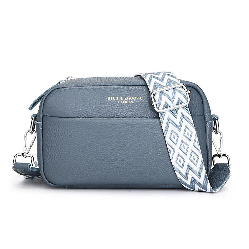 Stylish cowhide shoulder messenger bag with adjustable strap in various colours