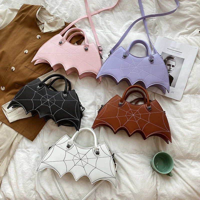 A stylish Halloween shoulder bag with a captivating spider web design, made of durable PU leather and offering ample storage space.