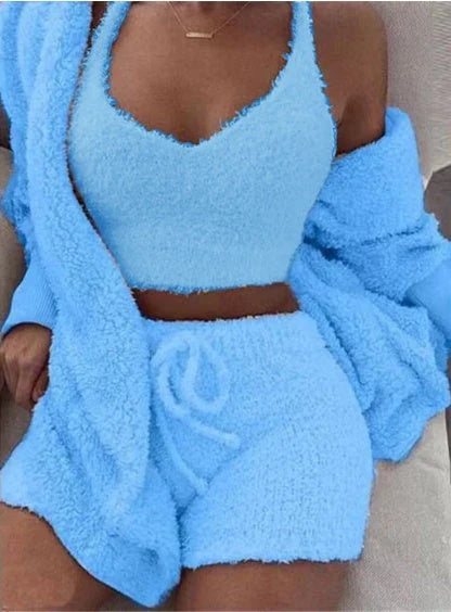 A cozy 3-piece loungewear set featuring a long sleeve crop top and drawstring shorts in a variety of stylish colors.
