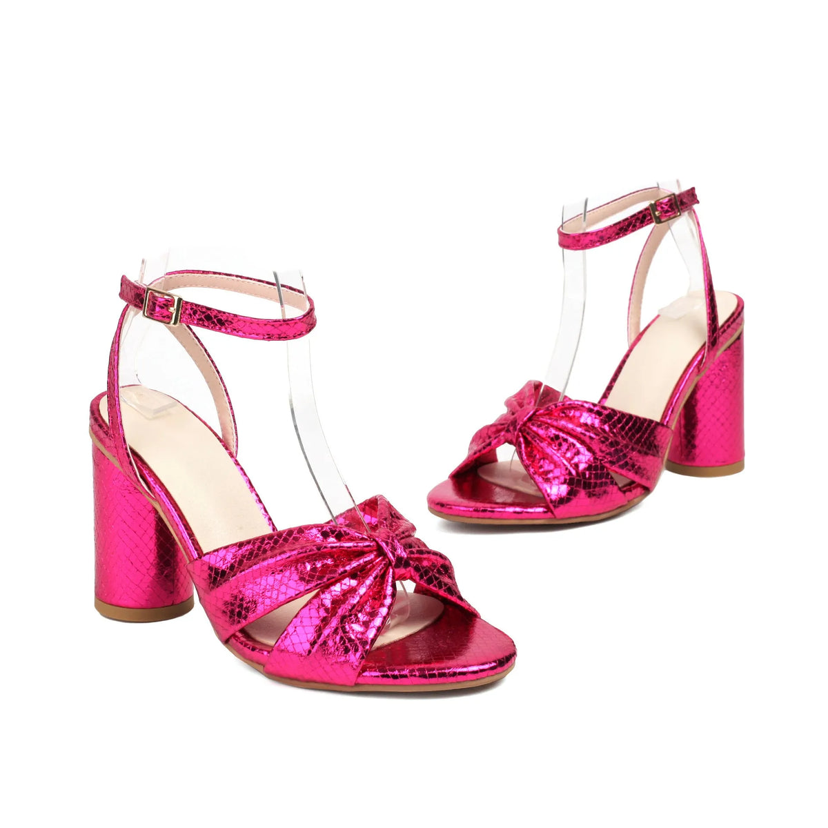 Gold plus size high heel peep toe sandal with an ankle strap buckle on a white background