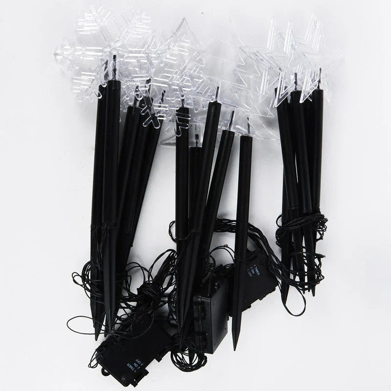 Enchanting acrylic snowflake garden lights that automatically illuminate your outdoor space with a warm, soft glow