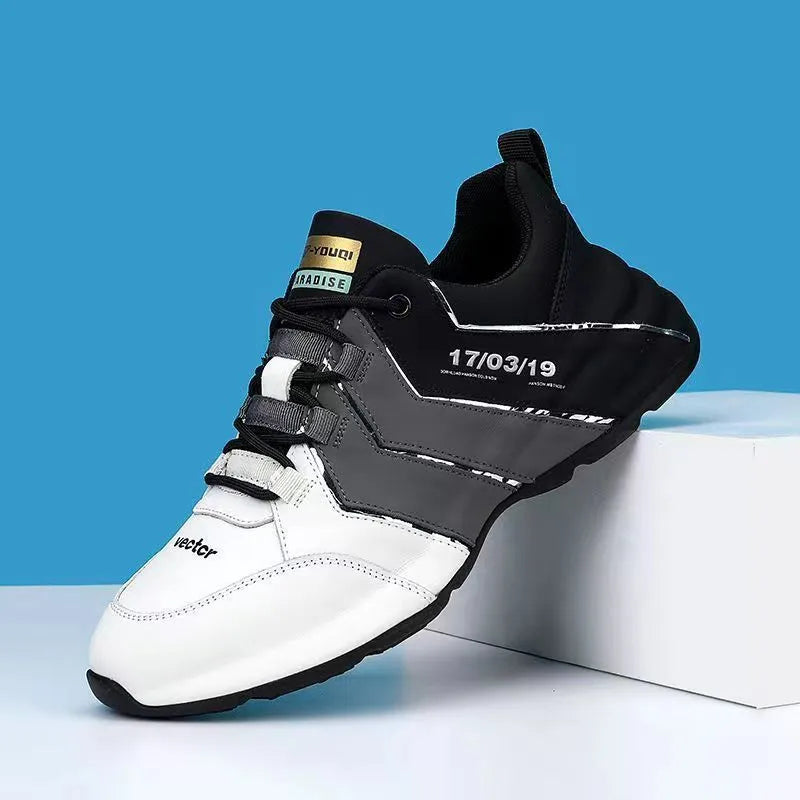 Pair of casual low-top lace-up sneakers with round toe and mesh lining on a plain background.