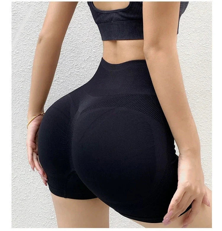 Curve-enhancing seamless yoga shorts for women in a variety of vibrant colors