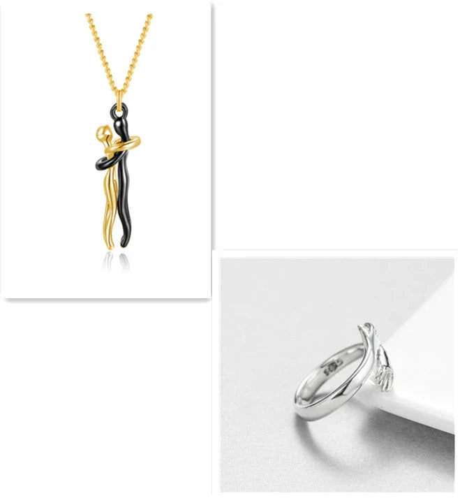Stylish embracing pendant necklace in various colors, including rose gold, white black, black gold, and more. Minimalist design with a delicate chain.