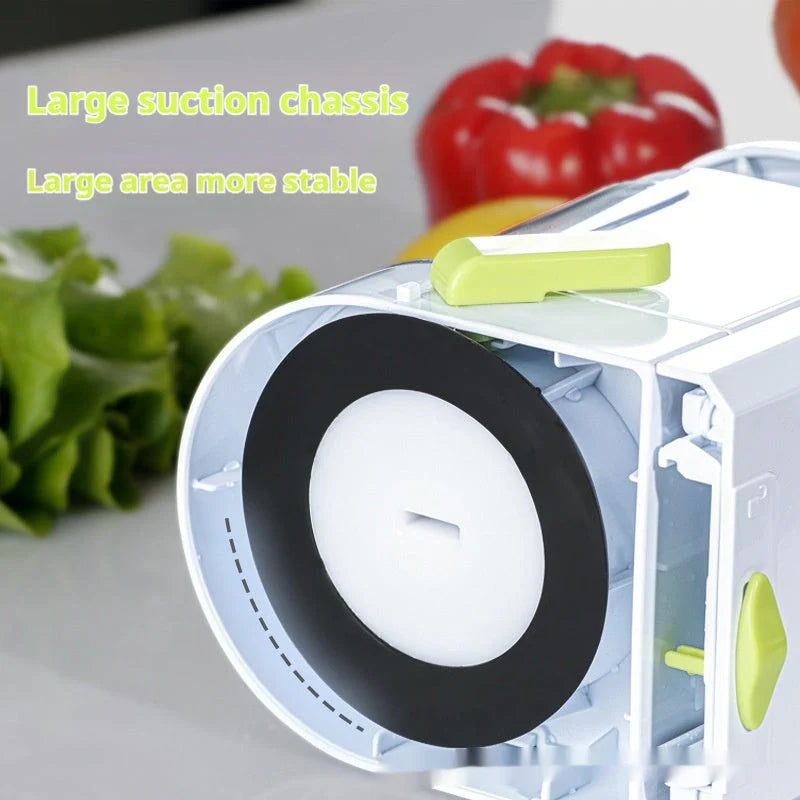Multifunctional mandoline slicer with suction base and four drum blades for versatile kitchen prep.