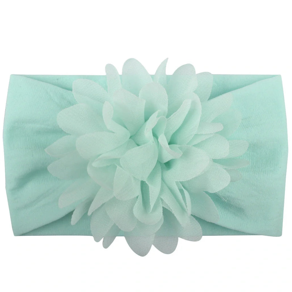 Handcrafted chiffon flower baby headband for little princesses, available in various colours and styles.