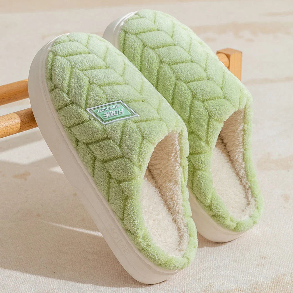 Cosy plush slippers with thick, non-slip soles and fleece lining, available in a variety of stylish colours