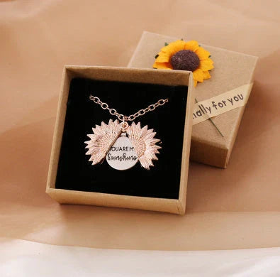A stunning sunflower pendant necklace with an adjustable chain, crafted from high-quality materials for a radiant and versatile accessory.