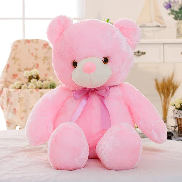 Illuminating plush teddy bear with color-changing LED lights, soft and huggable design in various sizes and colors