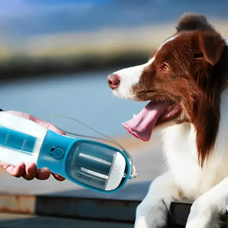 Portable 3-in-1 pet water bottle with built-in filtration system, food container, and waste bag storage compartment