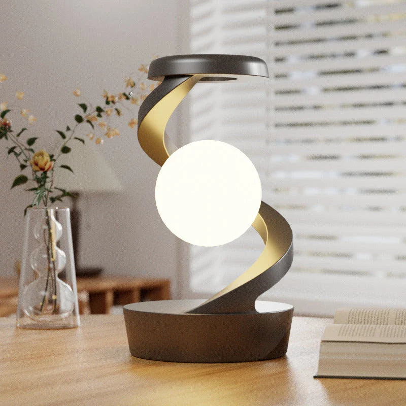 Stylish Rotating Moon Lamp with Wireless Phone Charging - Captivating Desk Accessory with Soothing Lighting and Convenient Wireless Charging