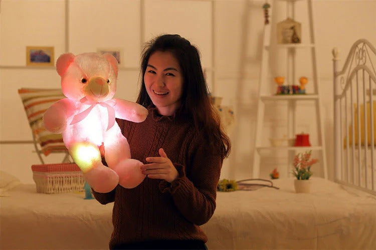 Illuminating plush teddy bear with color-changing LED lights, soft and huggable design in various sizes and colors