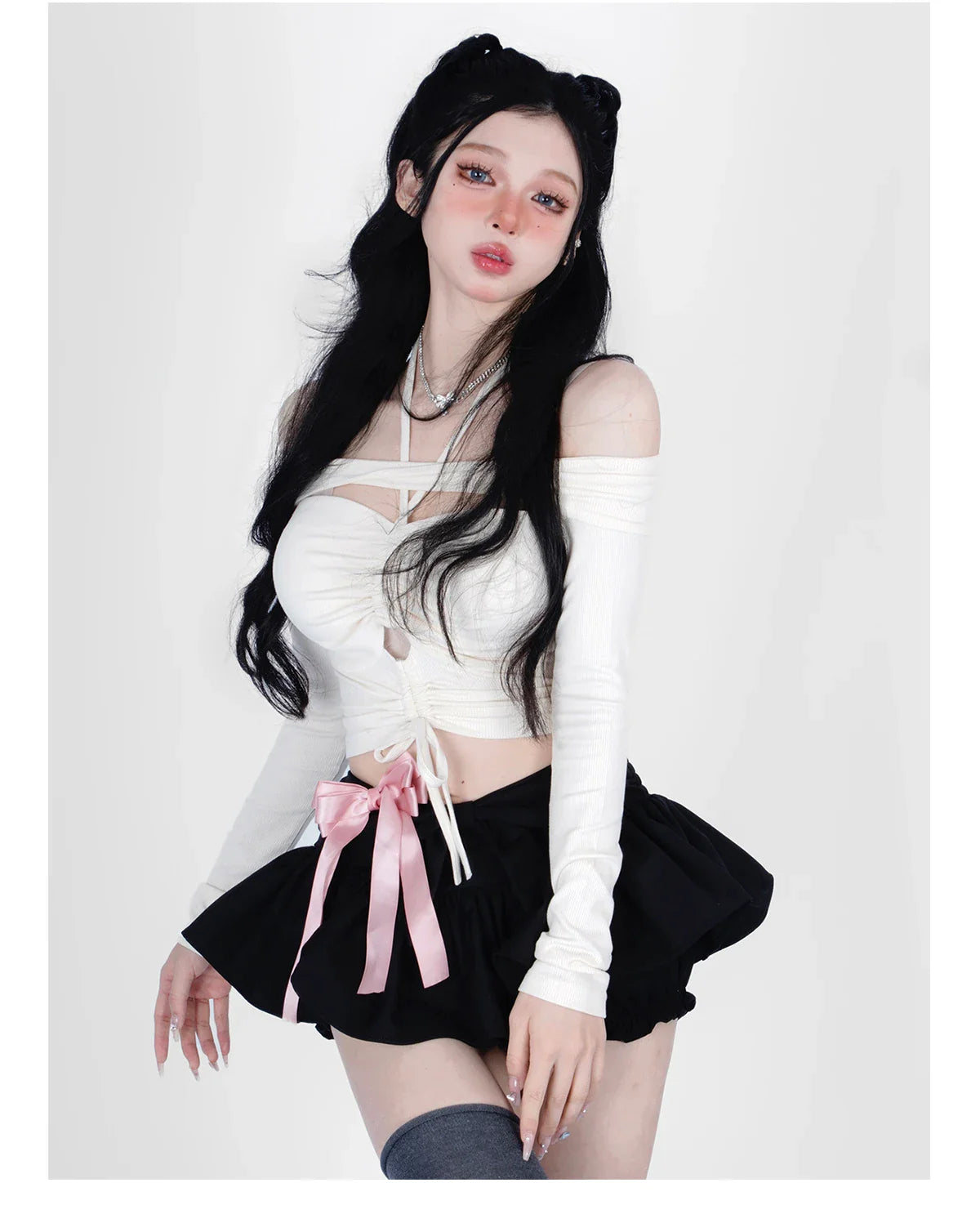 Off-shoulder blouse with drawstring waist, cut-out details, and long sleeves in a warm apricot colour