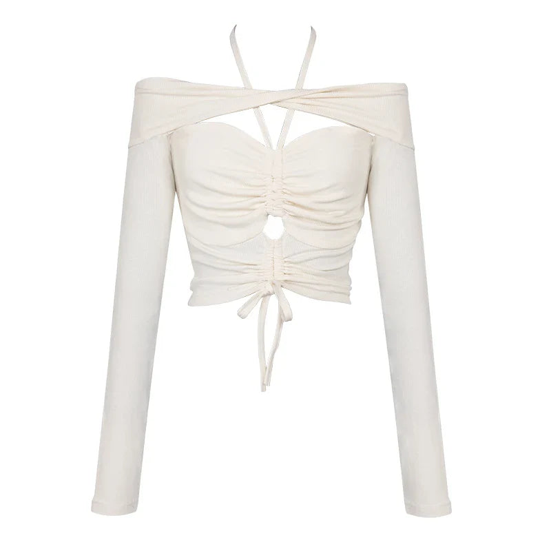 Off-shoulder blouse with drawstring waist, cut-out details, and long sleeves in a warm apricot colour