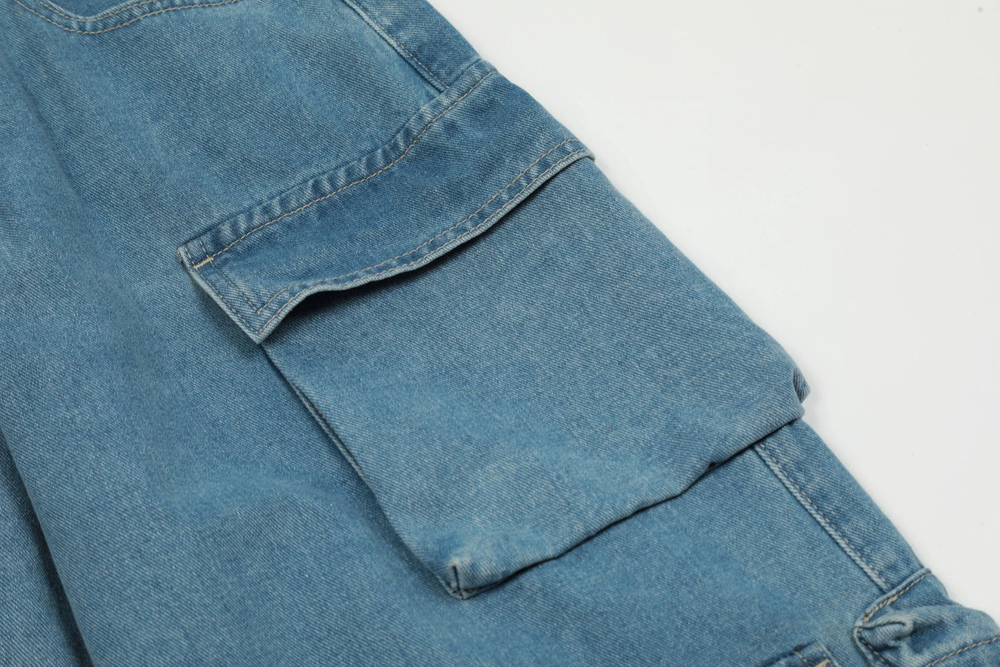 American High Street Multi-pocket Washed Baggy Jeans in Blue, featuring a relaxed, baggy fit and multiple pockets for functional style.