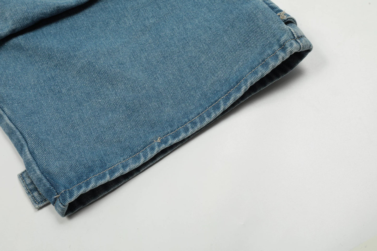 American High Street Multi-pocket Washed Baggy Jeans in Blue, featuring a relaxed, baggy fit and multiple pockets for functional style.