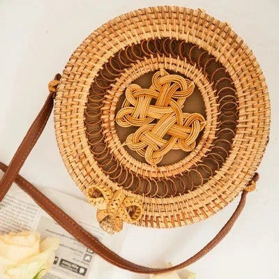 Rattan hand-woven bag with Chinese knot design, showcasing natural material and traditional craftsmanship