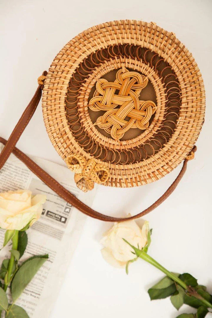Rattan hand-woven bag with Chinese knot design, showcasing natural material and traditional craftsmanship