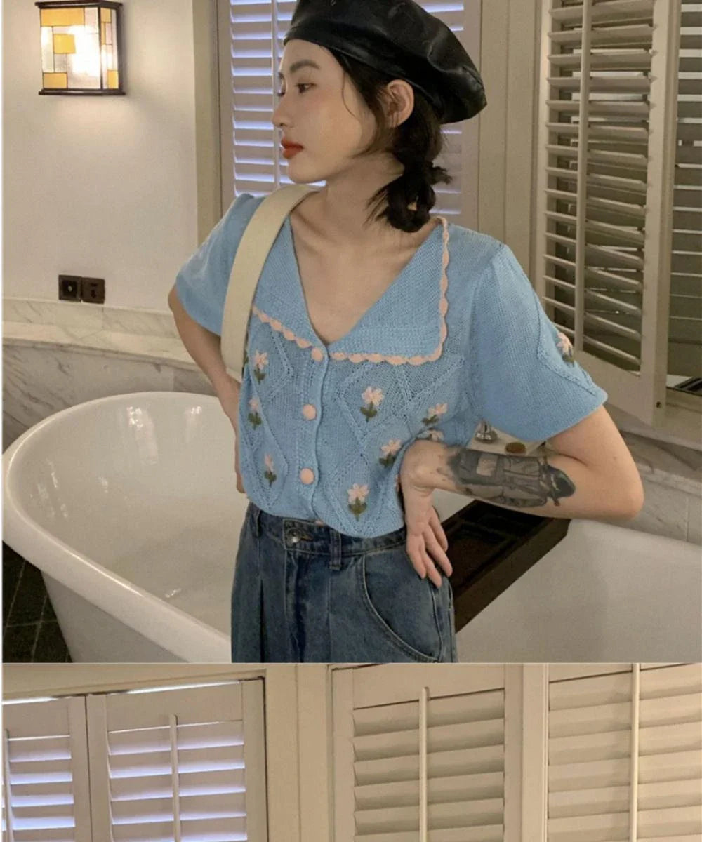 French-inspired short-sleeved cardigan with embroidered details in summer yellow and sky blue colours