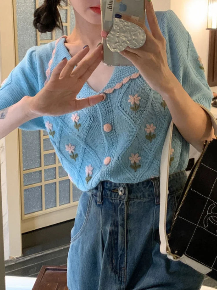French-inspired short-sleeved cardigan with embroidered details in summer yellow and sky blue colours