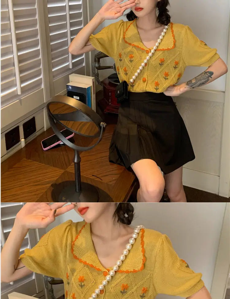 French-inspired short-sleeved cardigan with embroidered details in summer yellow and sky blue colours