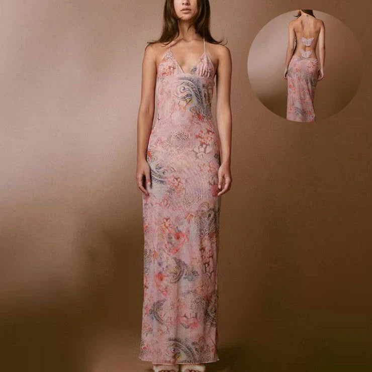 A stylish halter dress with a floral print and butterfly-inspired back, perfect for summer events and parties.