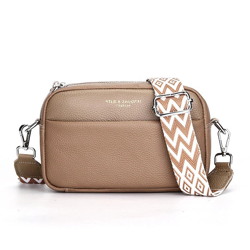Stylish cowhide shoulder messenger bag with adjustable strap in various colours