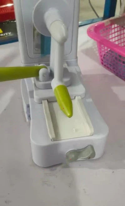 Versatile hand-powered vegetable slicer with interchangeable blades, suction base, and protective hand guard for effortless, safe meal prep