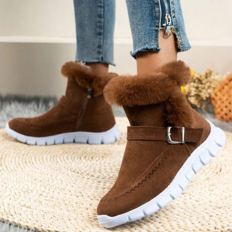 Plush ankle snow boots with buckle design and soft, warm lining for women in various color options