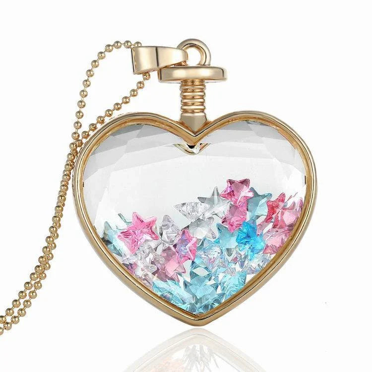 Elegant floral pendant necklace with a dried flower charm on a gold-tone chain
