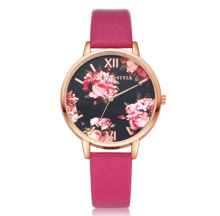 Elegant rose gold women's watch with leather strap and love heart design