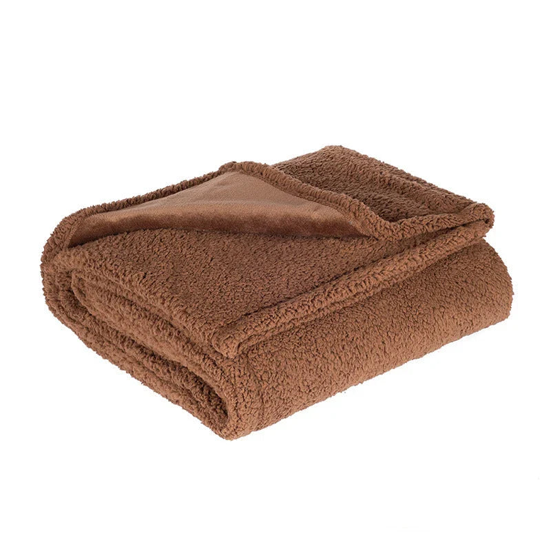 Cozy flannel dog blanket with soft sherpa accents for all-season comfort and warmth