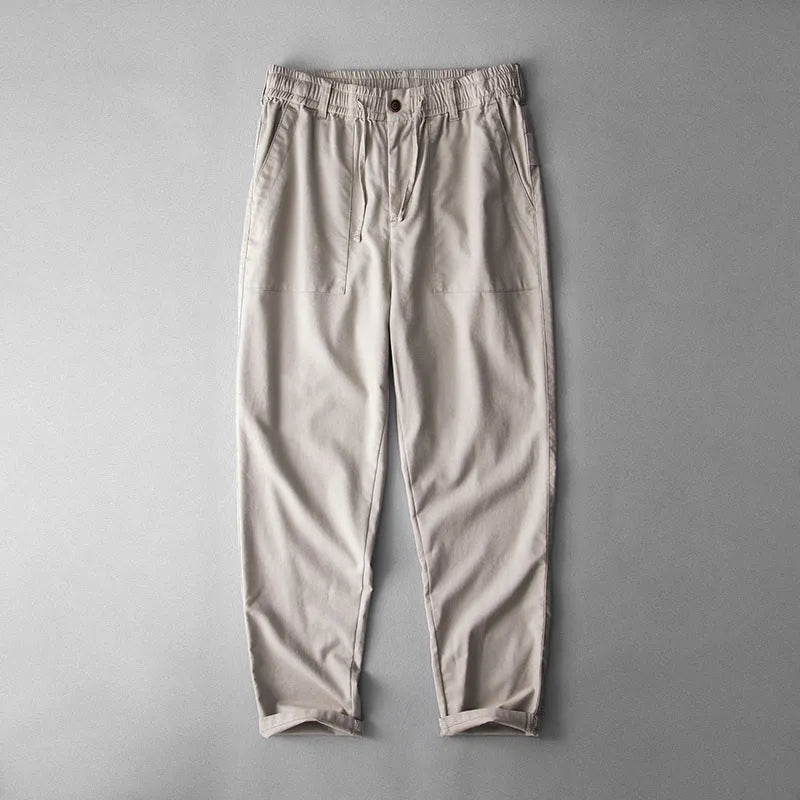 Men's solid colour linen trousers in mid-waist design available in three colours