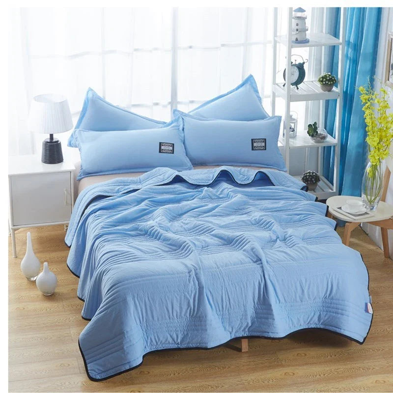 Premium all-season cooling comforter with soft, breathable fabric and plush fill for comfortable sleep