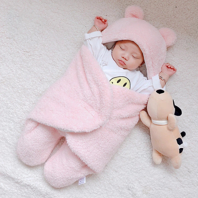 Cozy cotton baby sleeping bag with soft, breathable interior and warm, insulating outer layer