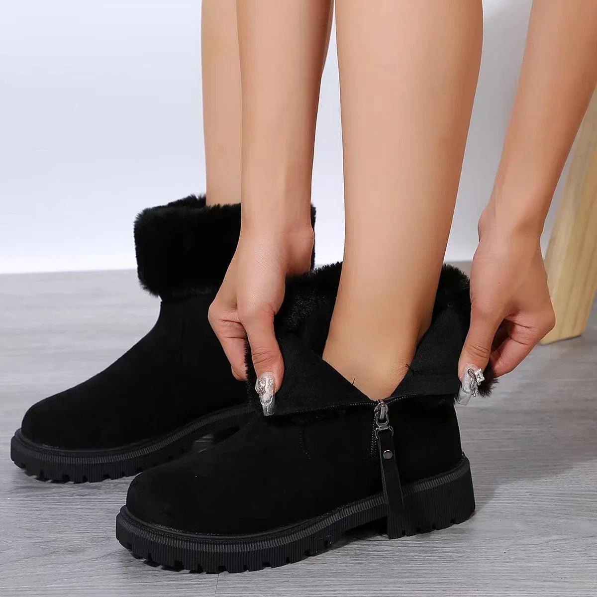 Cozy winter boots with side zipper, suede upper, and rubber sole for outdoor activities