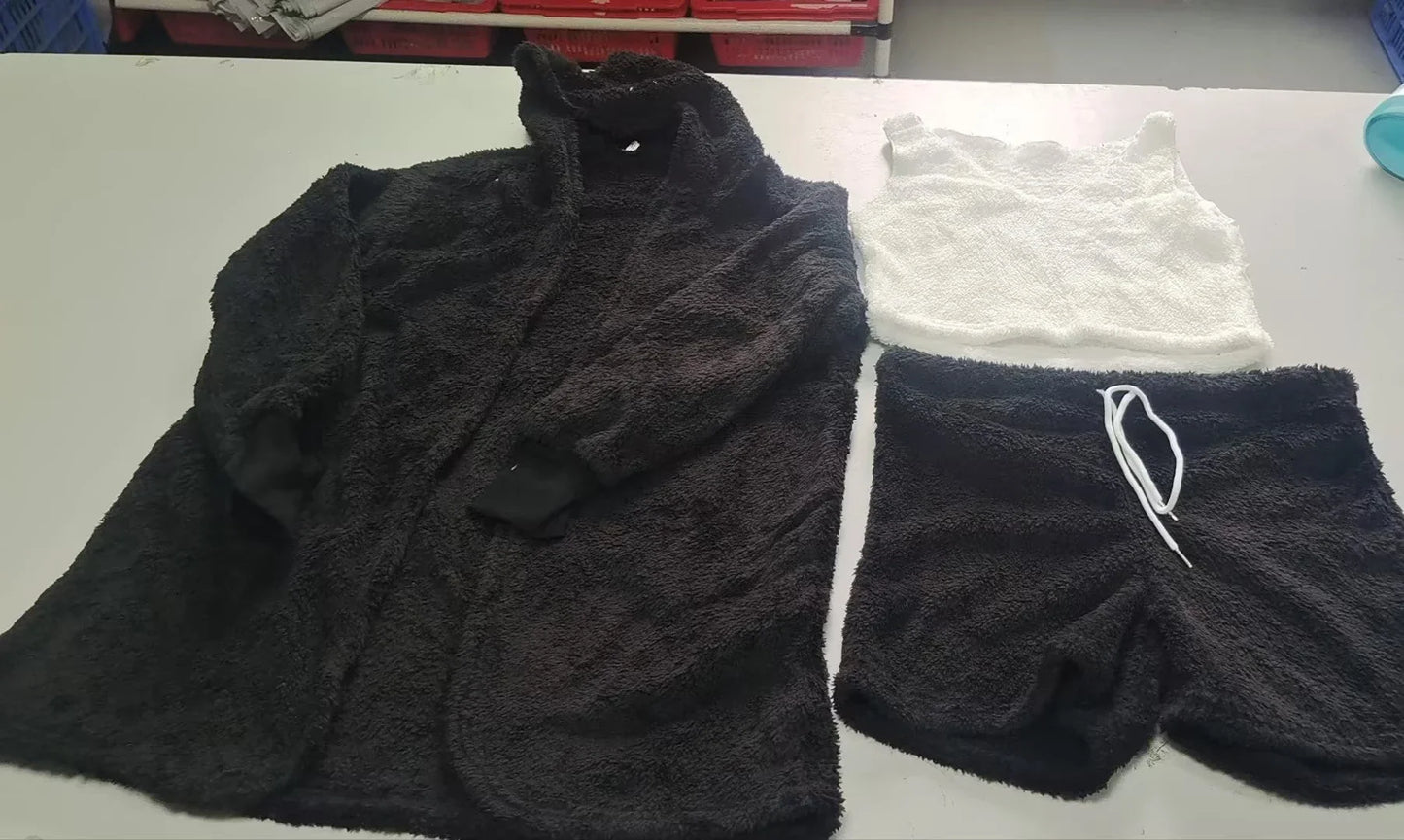A cozy 3-piece loungewear set featuring a long sleeve crop top and drawstring shorts in a variety of stylish colors.