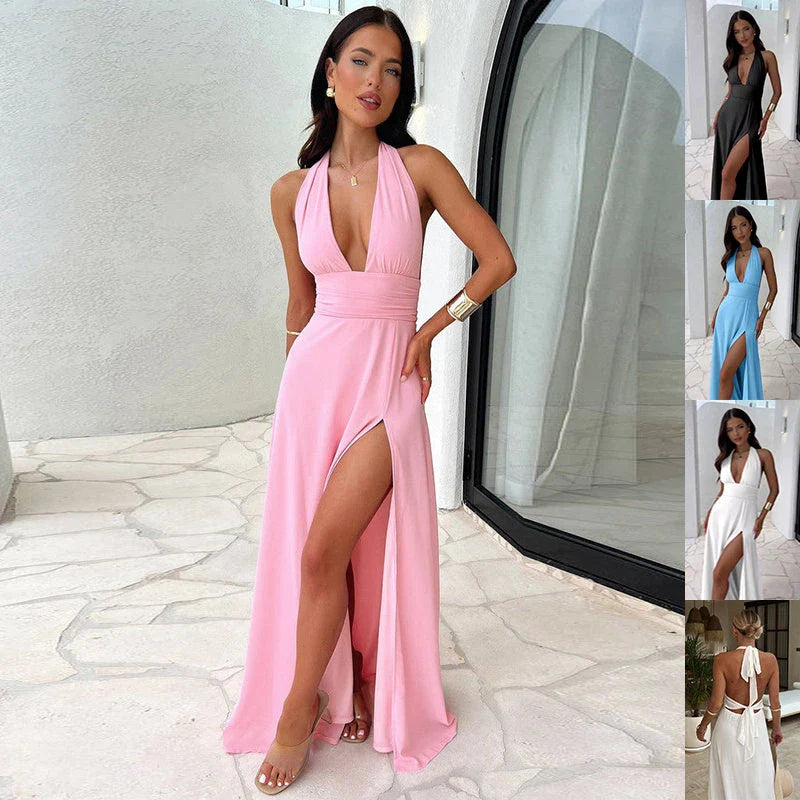A stylish backless halter neck maxi dress in various colors, featuring a high waist and thigh-high slit for a flattering, eye-catching look.