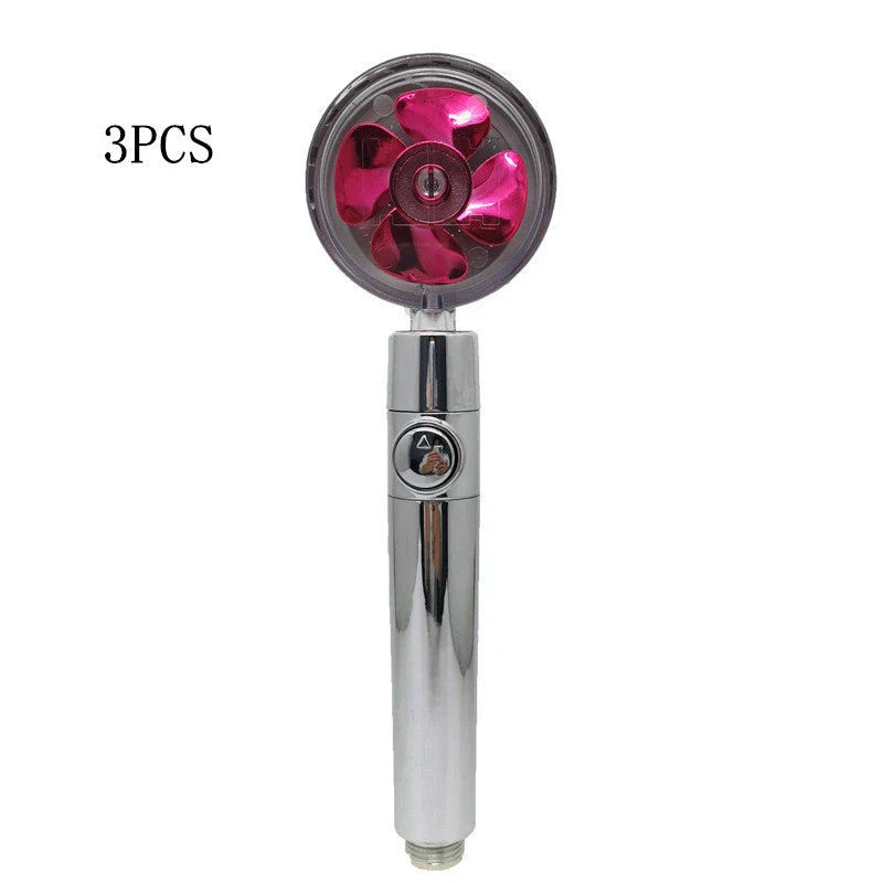 A high-pressure handheld shower head with a turbo-charged water flow and a cotton filter for a luxurious, spa-like bathing experience.
