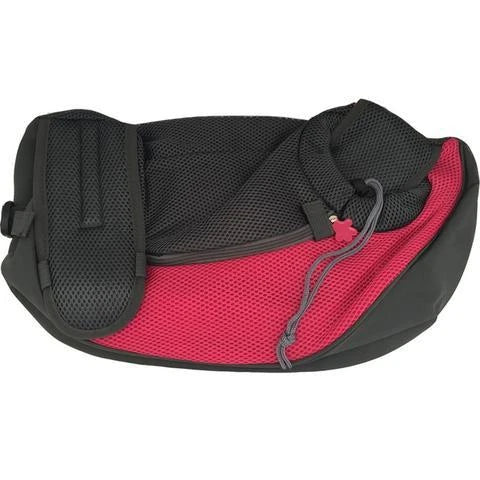 A comfortable and stylish pet sling bag with padded mesh and leather details, allowing hands-free travel for pet owners.