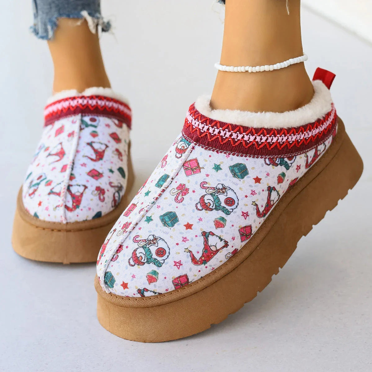 Cozy winter ankle boots featuring festive Christmas prints and plush lining for women