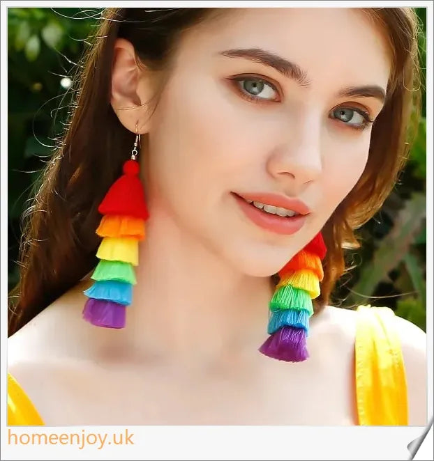 Vibrant bohemian-inspired tassel earrings in rainbow and rose colours, perfect for summer fashion and vacations