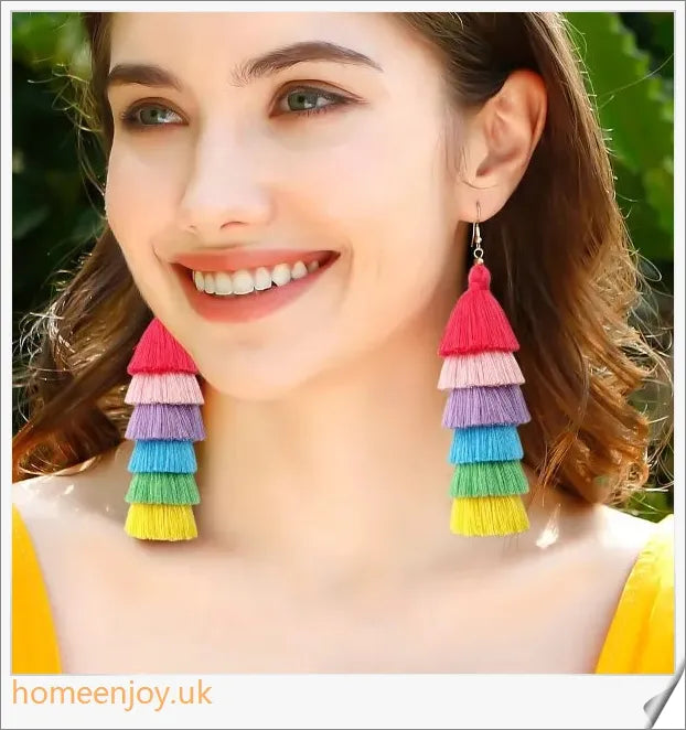 Vibrant bohemian-inspired tassel earrings in rainbow and rose colours, perfect for summer fashion and vacations