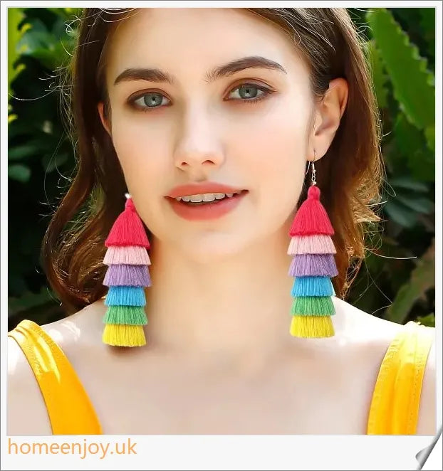 Vibrant bohemian-inspired tassel earrings in rainbow and rose colours, perfect for summer fashion and vacations